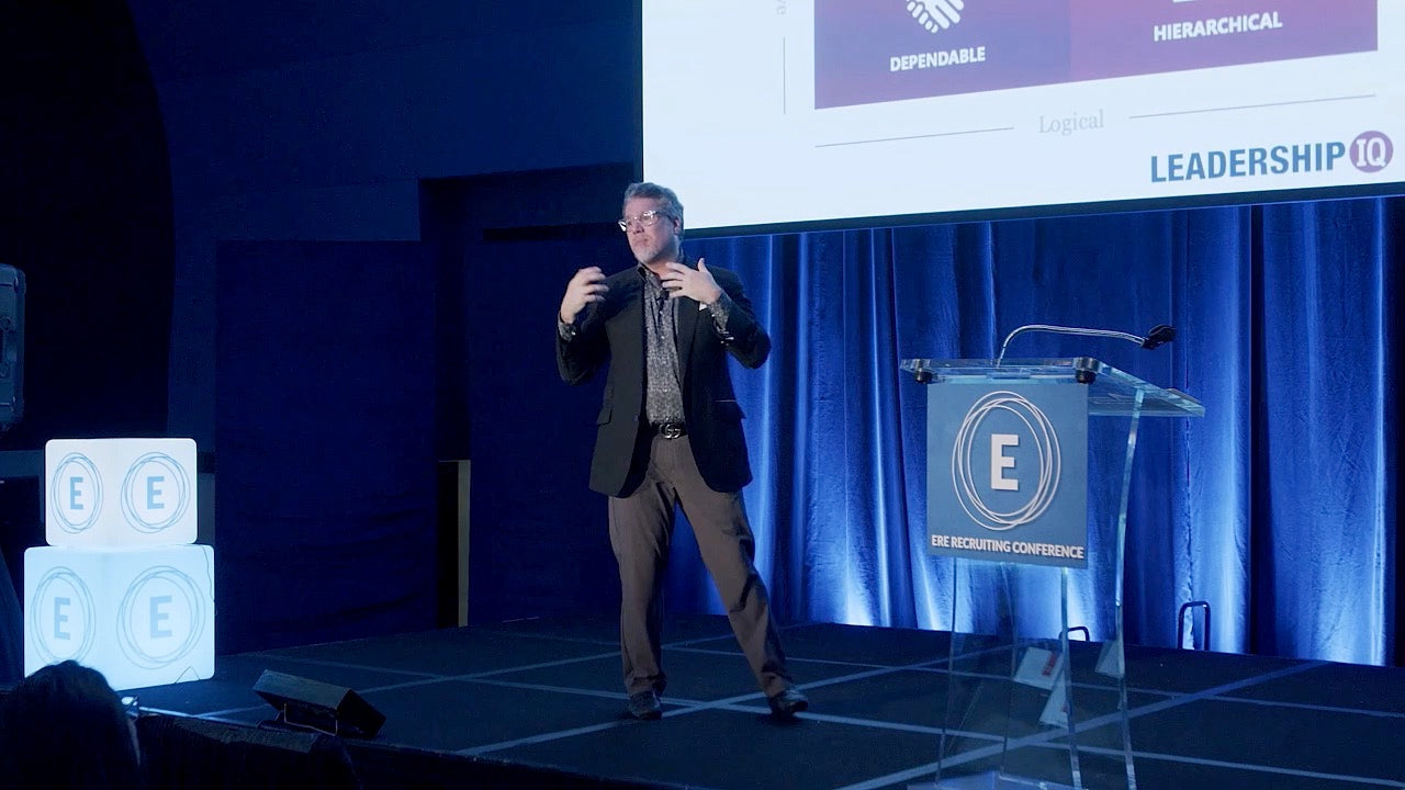 Mark Murphy delivering a keynote speech on stage